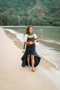 elopement at kahana bay with ocean and green mountains